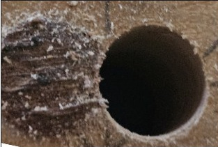 Drill a second overlapping hole